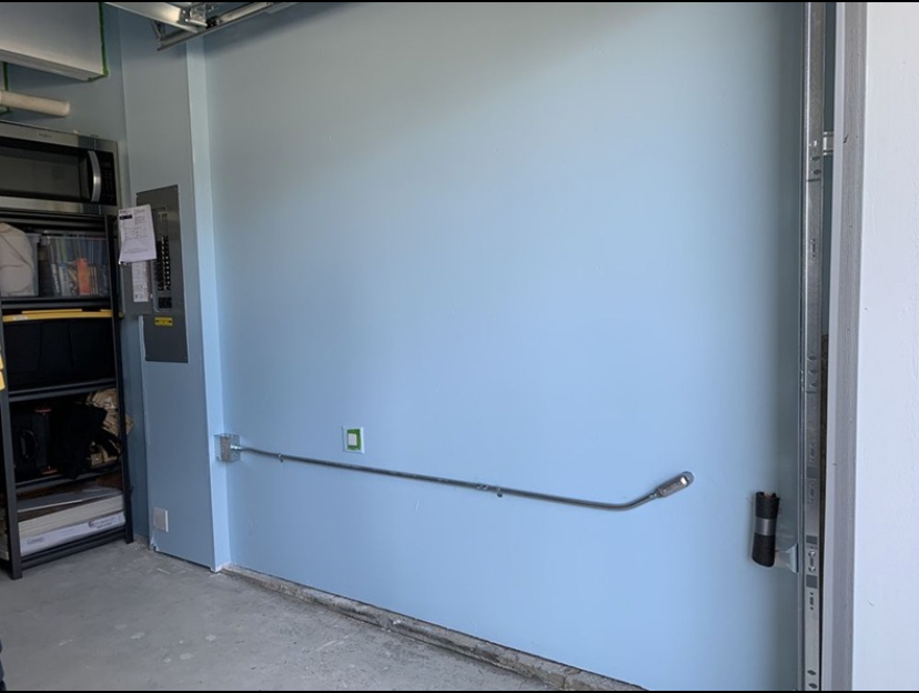 Neat conduit run from panel — professional finish work